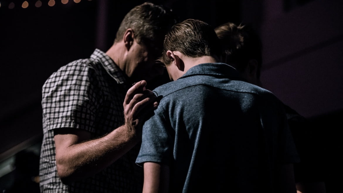 men praying, forgiveness